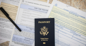 Read more about the article U.S. PASSPORT PROCESSING RESUMES AS CENTERS FIRST TACKLE A CORONAVIRUS BACKLOG